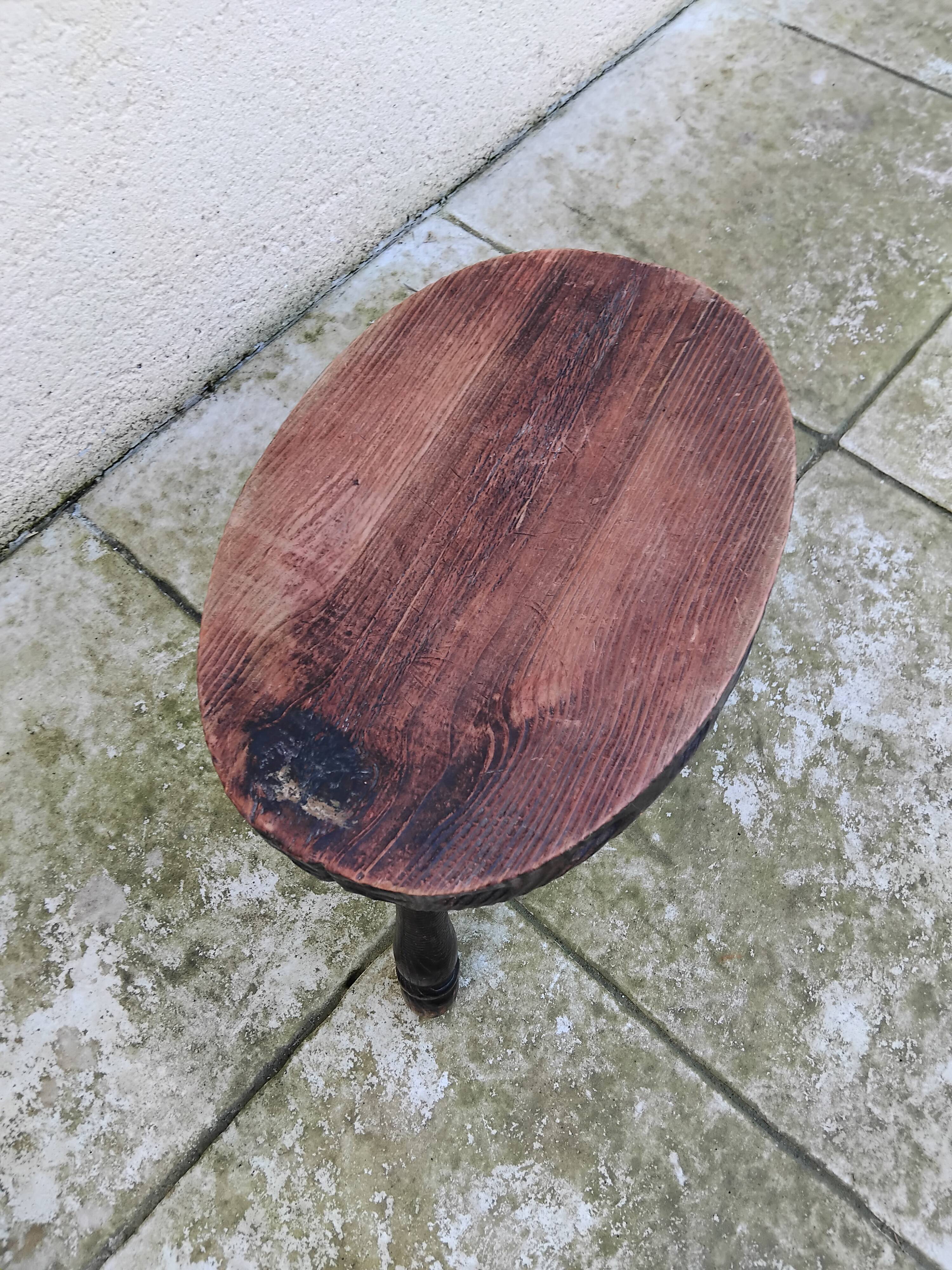 Old vintage oval tripod stool