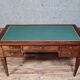 Bureau de centre double face Louis XVI en acajou vers 1850