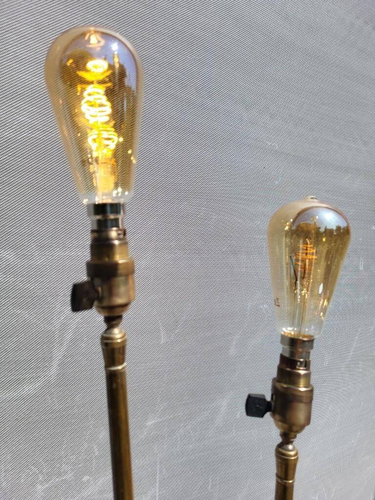Three-light painter's table lamp in brass from the 1950s.