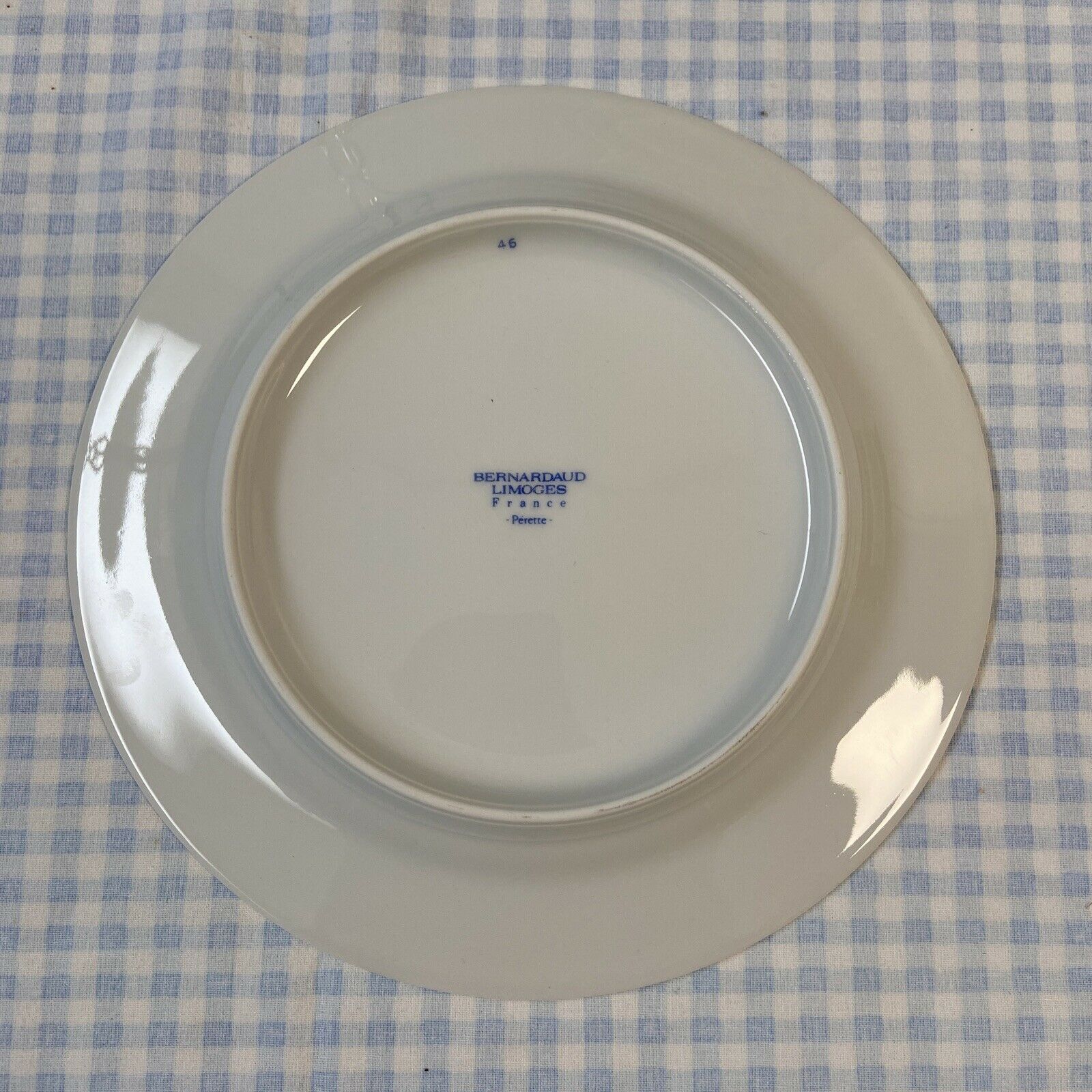Series of 12 porcelain dessert plates decorated with flowers Bernardaud Limoges