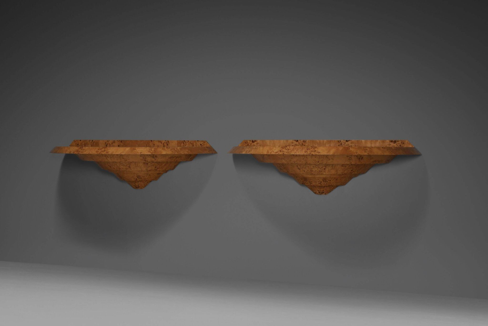 Elegant pair of Art Deco consoles in burl wood