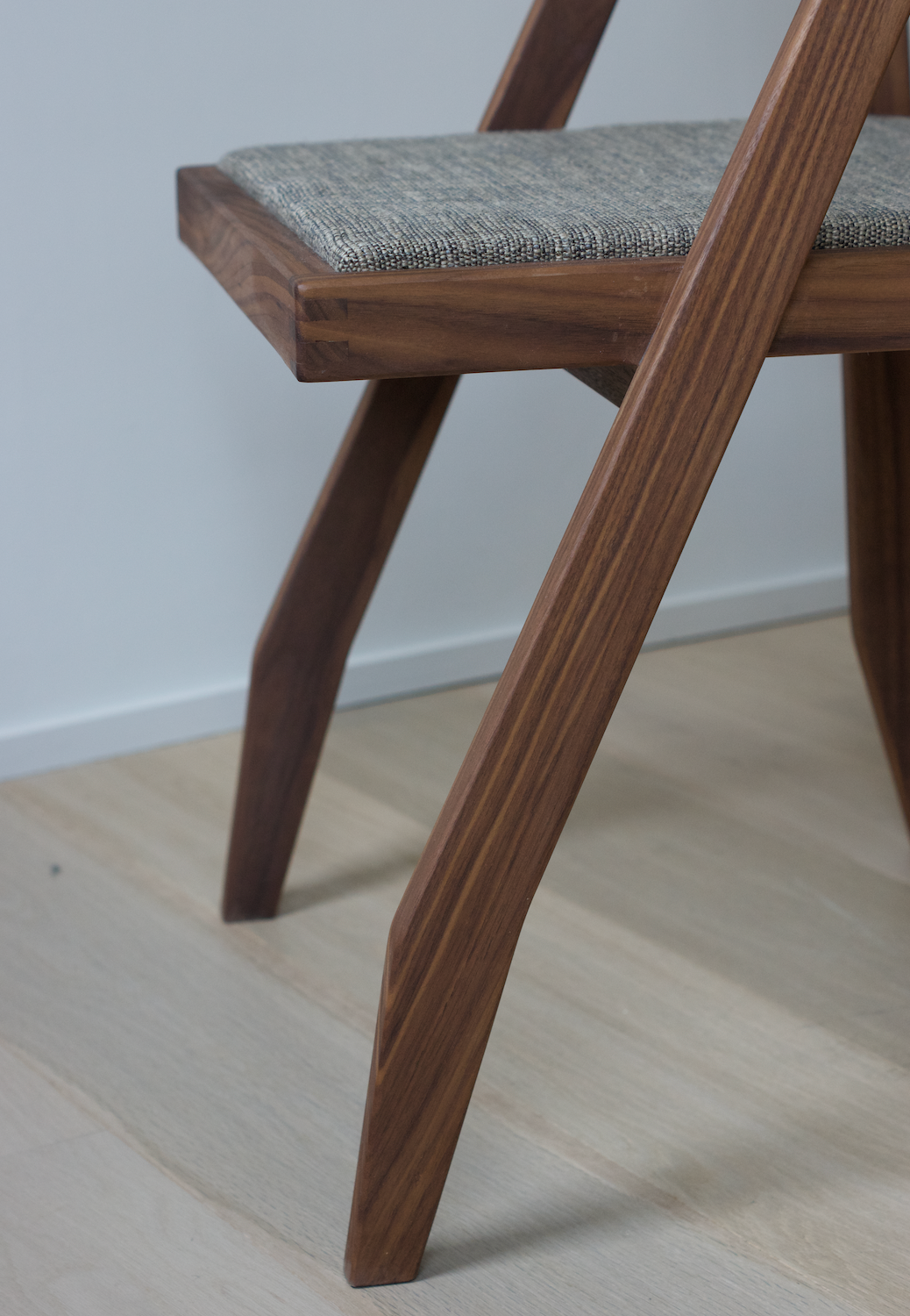 Walnut chair designed by Martin Gillis Studio