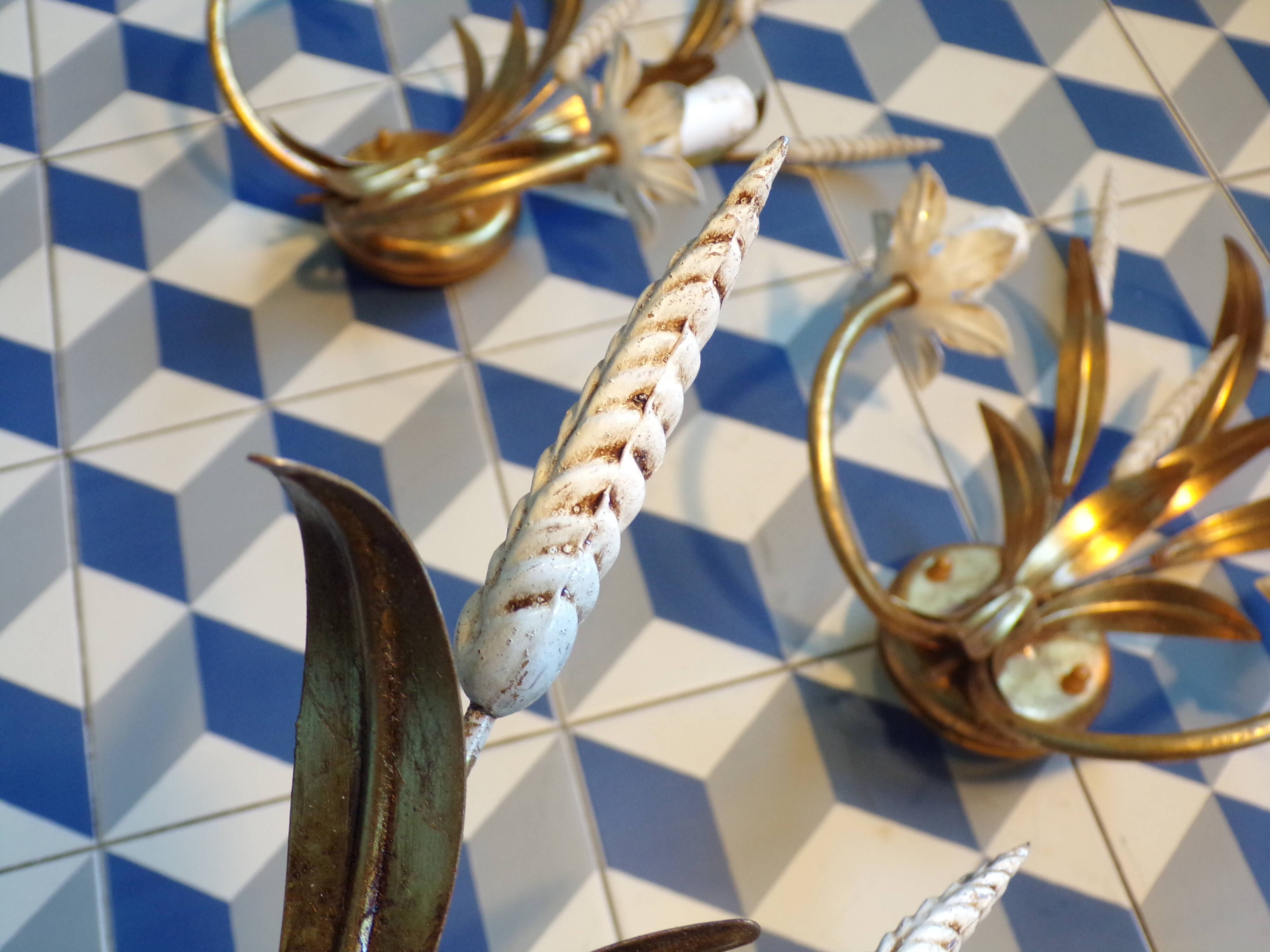 Trio of golden iron wheat ear wall lights
