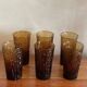 6 orangeade glasses with tree bark