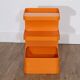 Vintage orange plastic dessert set from the 1970s.