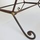 Paire de fauteuils en fer forgé et cuir vintage