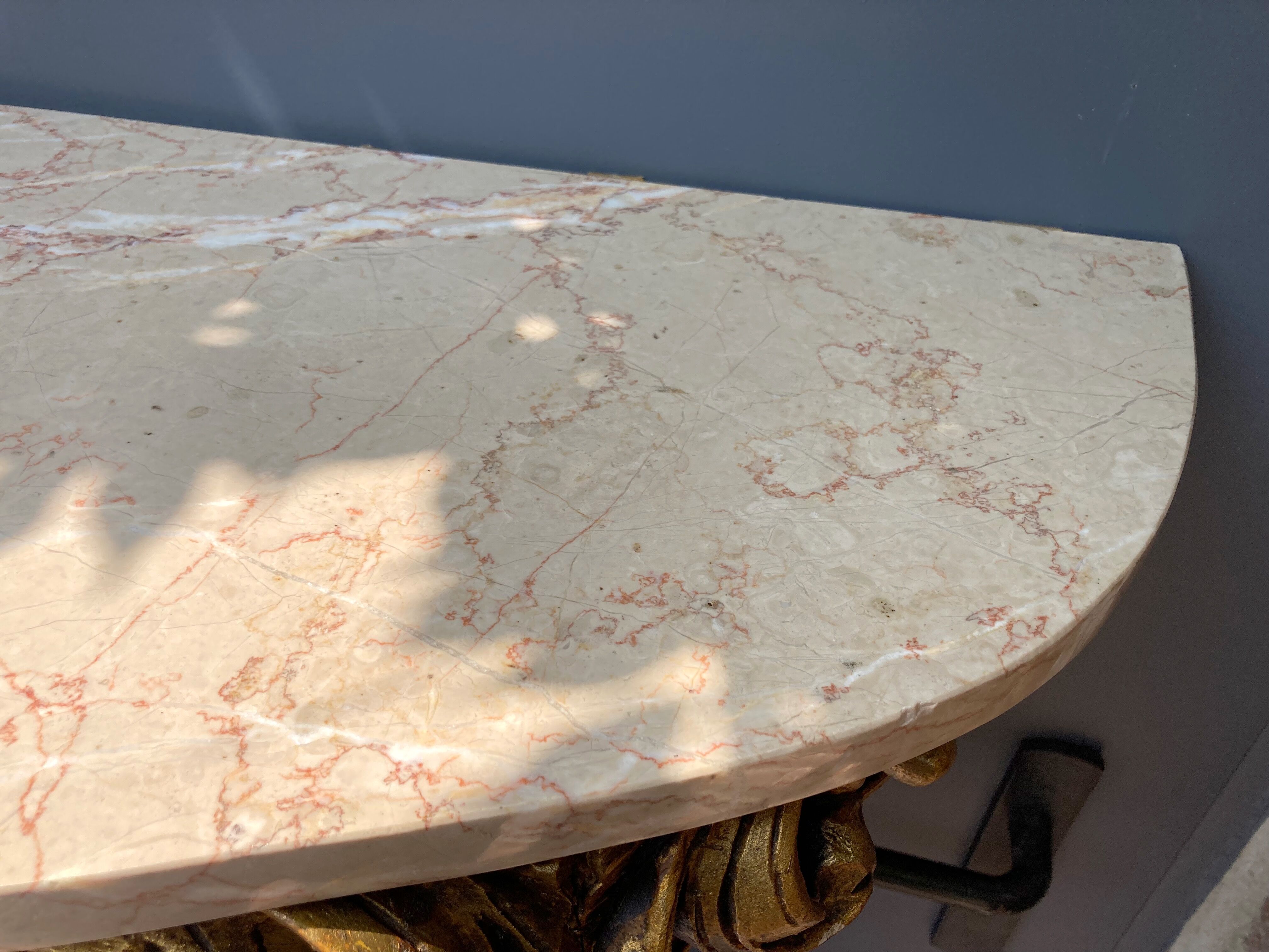 Carved wooden and marble console