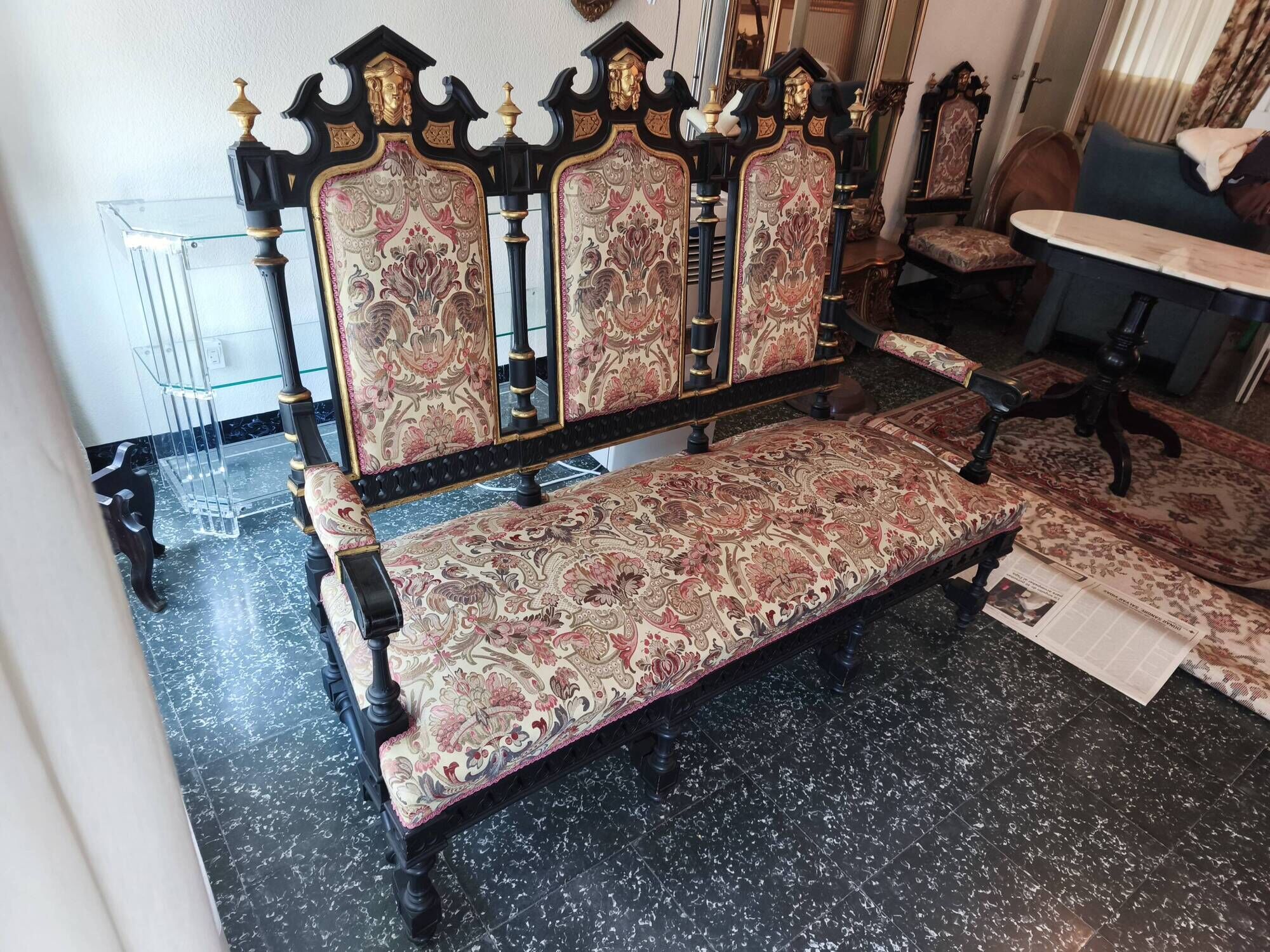 Historicist three-seater canapé in ebonised wood.