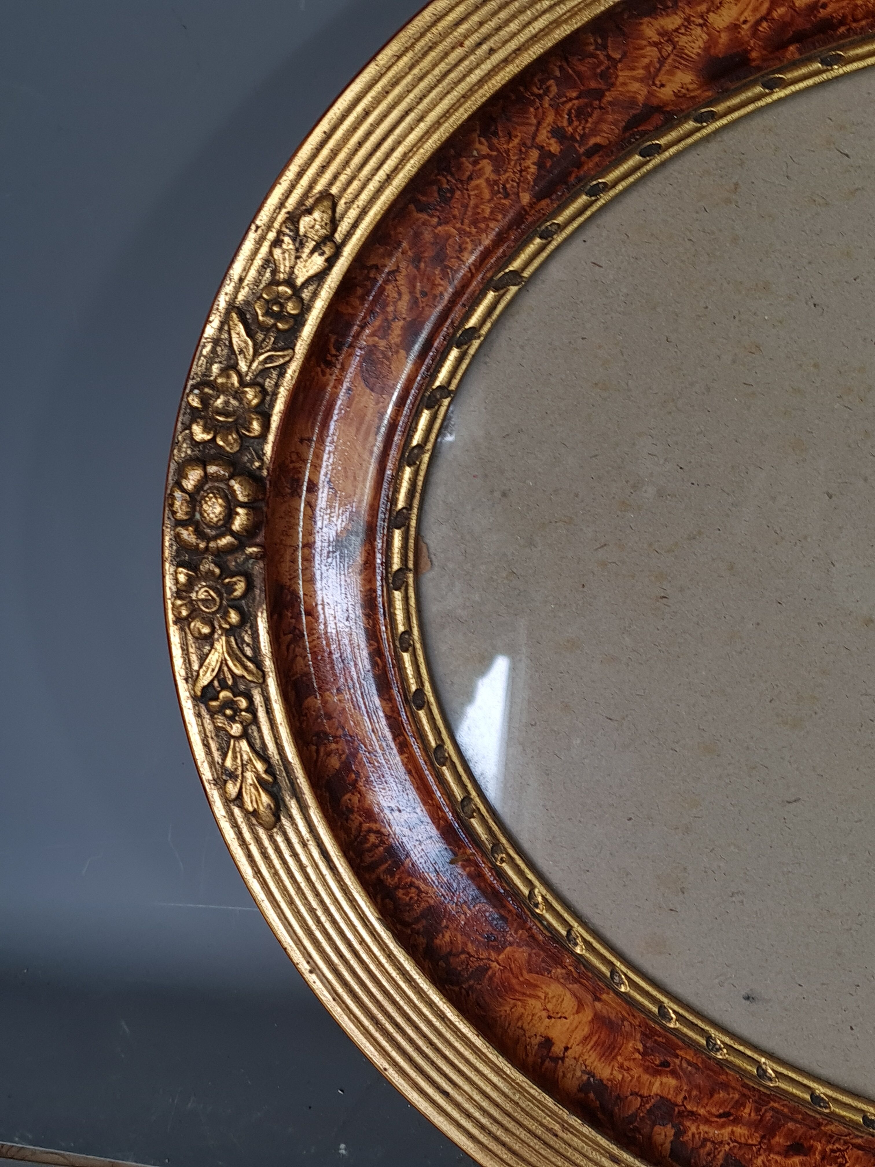 Old oval frame gilded stucco wood