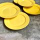 12 yellow earthenware dinner plates