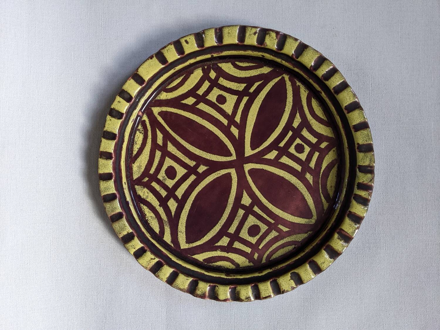 Extra-large enameled copper tray or catchall with ethnic tribal decoration.