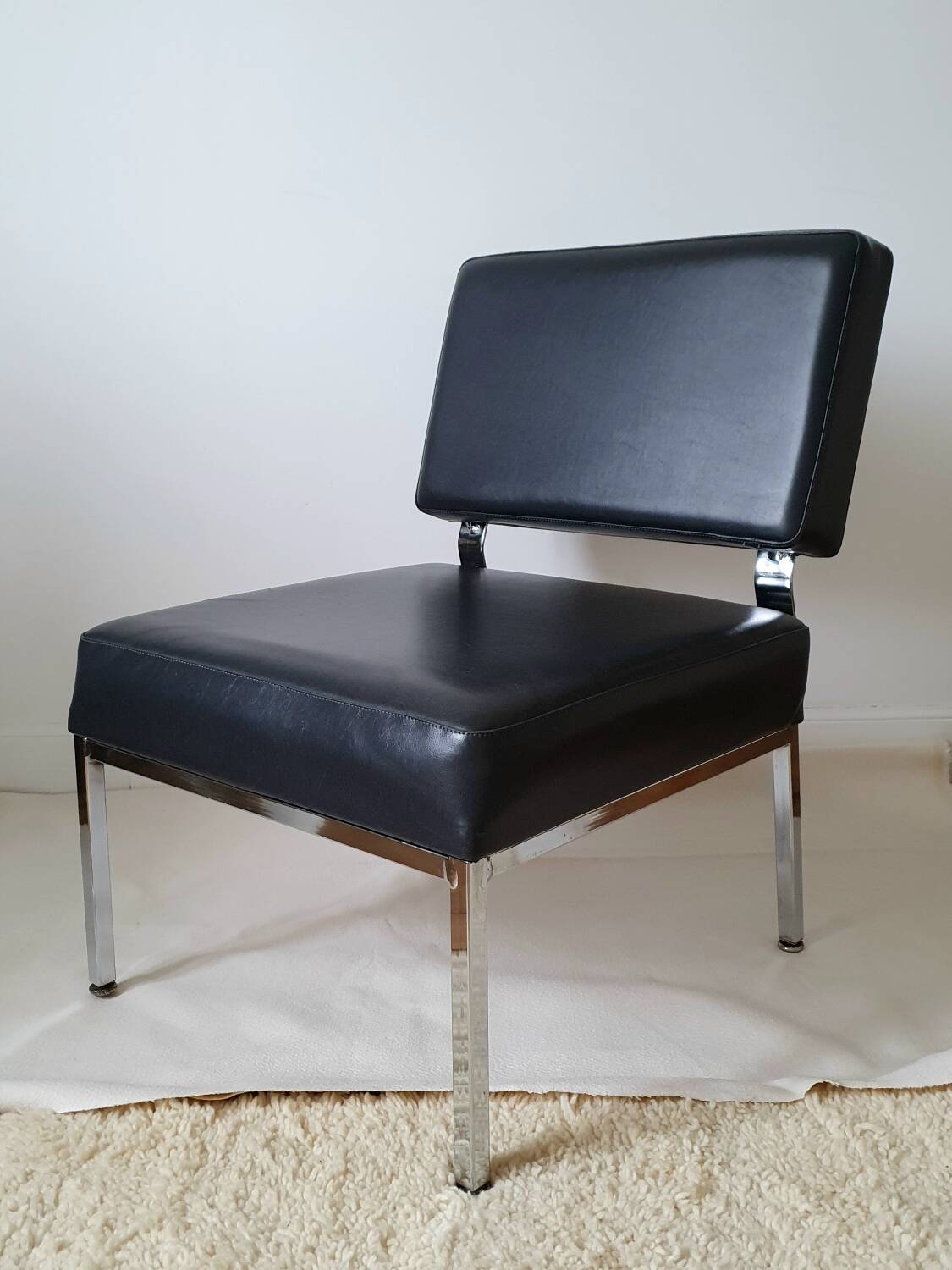 Chrome metal and imitation leather armchair from the 50s