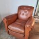 Ancien fauteuil club en cuir, vers 1940 style art déco