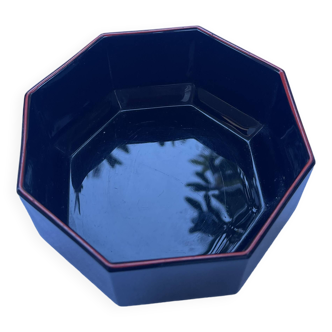 Black Arcoroc octagonal bowl with red edging.