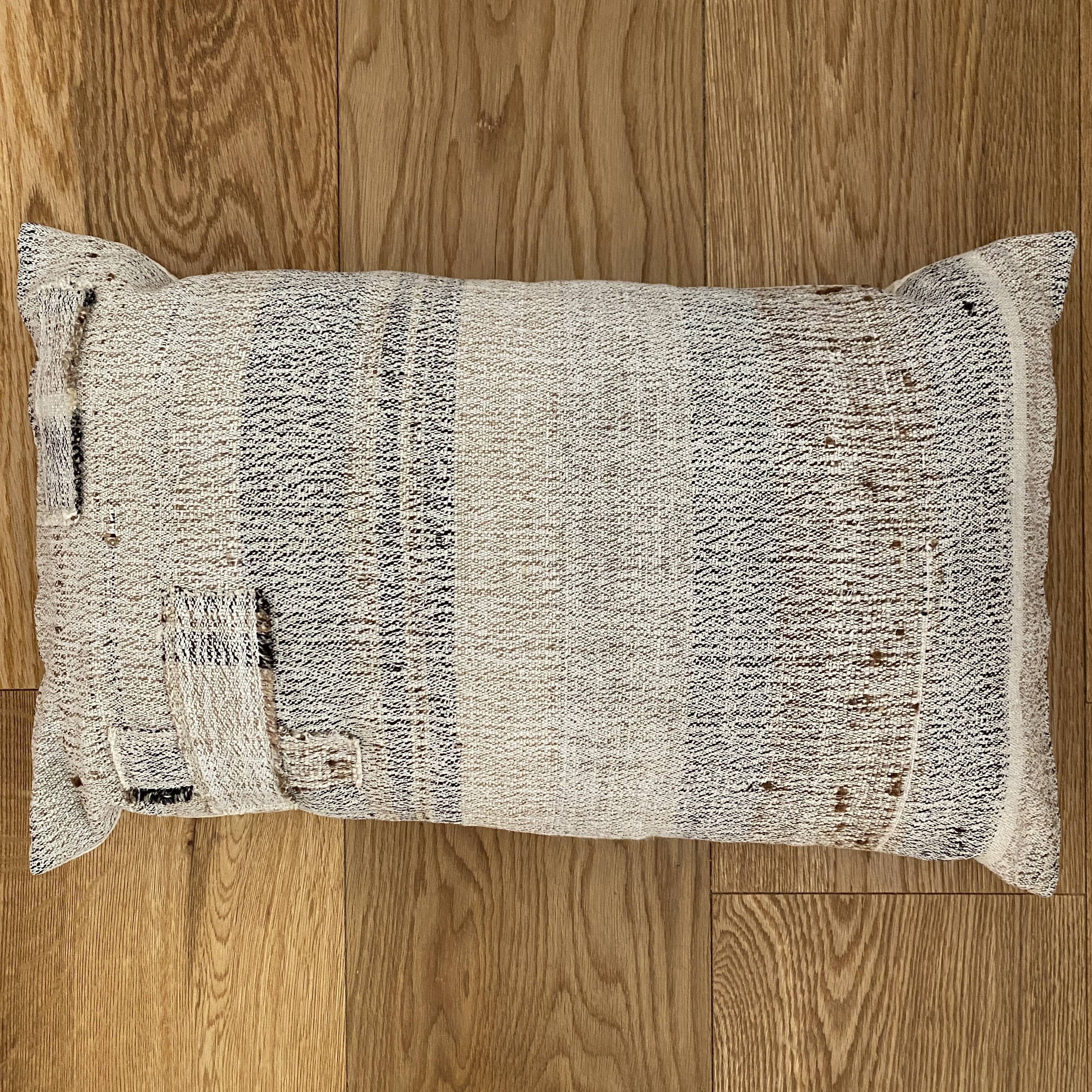 Cushion in vintage woven kilim style, patched.