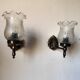Pair of wall sconces in bronze with opaline glass tulips.