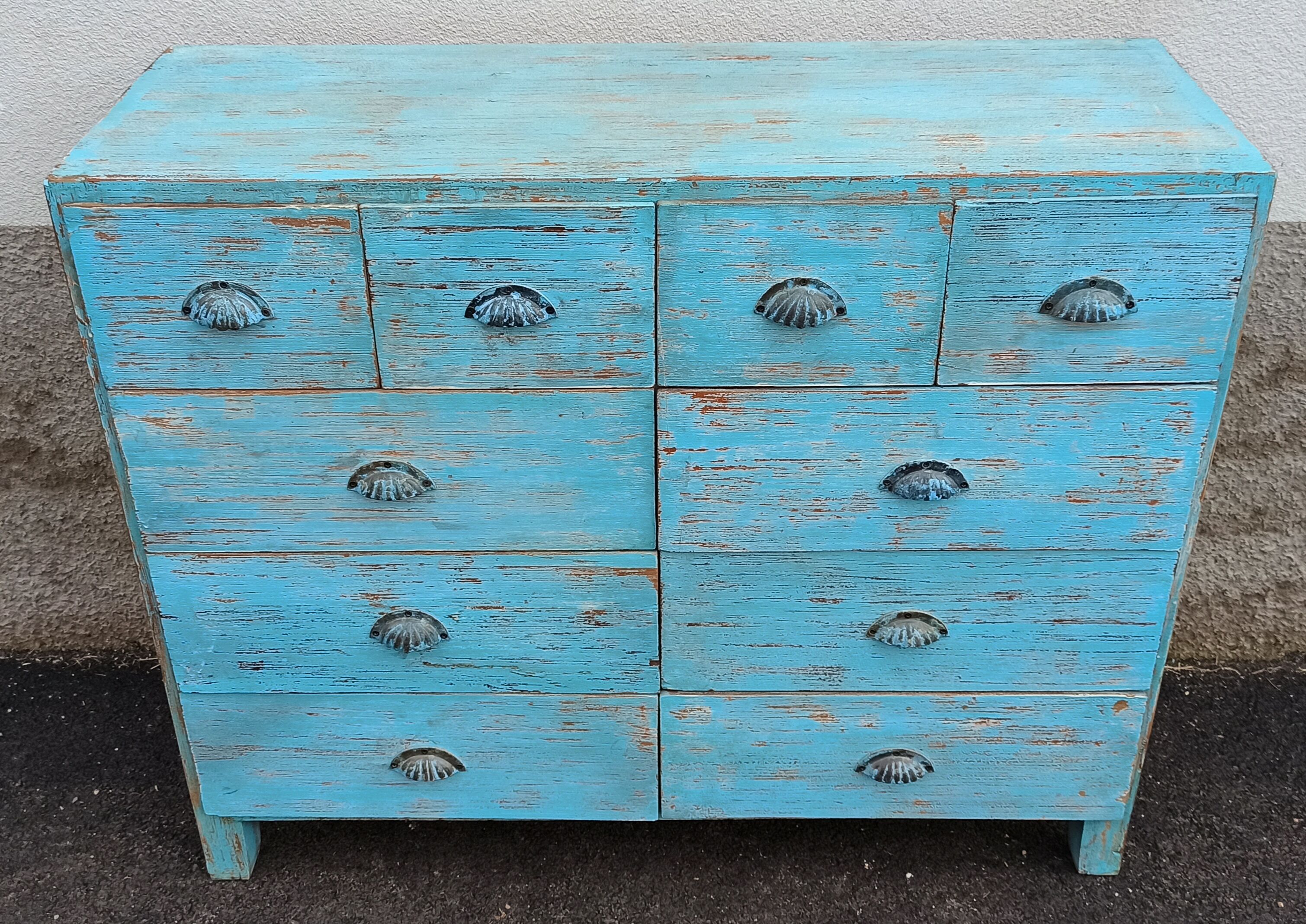 Blue wooden dresser with drawers