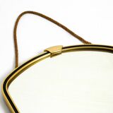 Beautiful small mid-century brass wall mirror with braided hanging strap