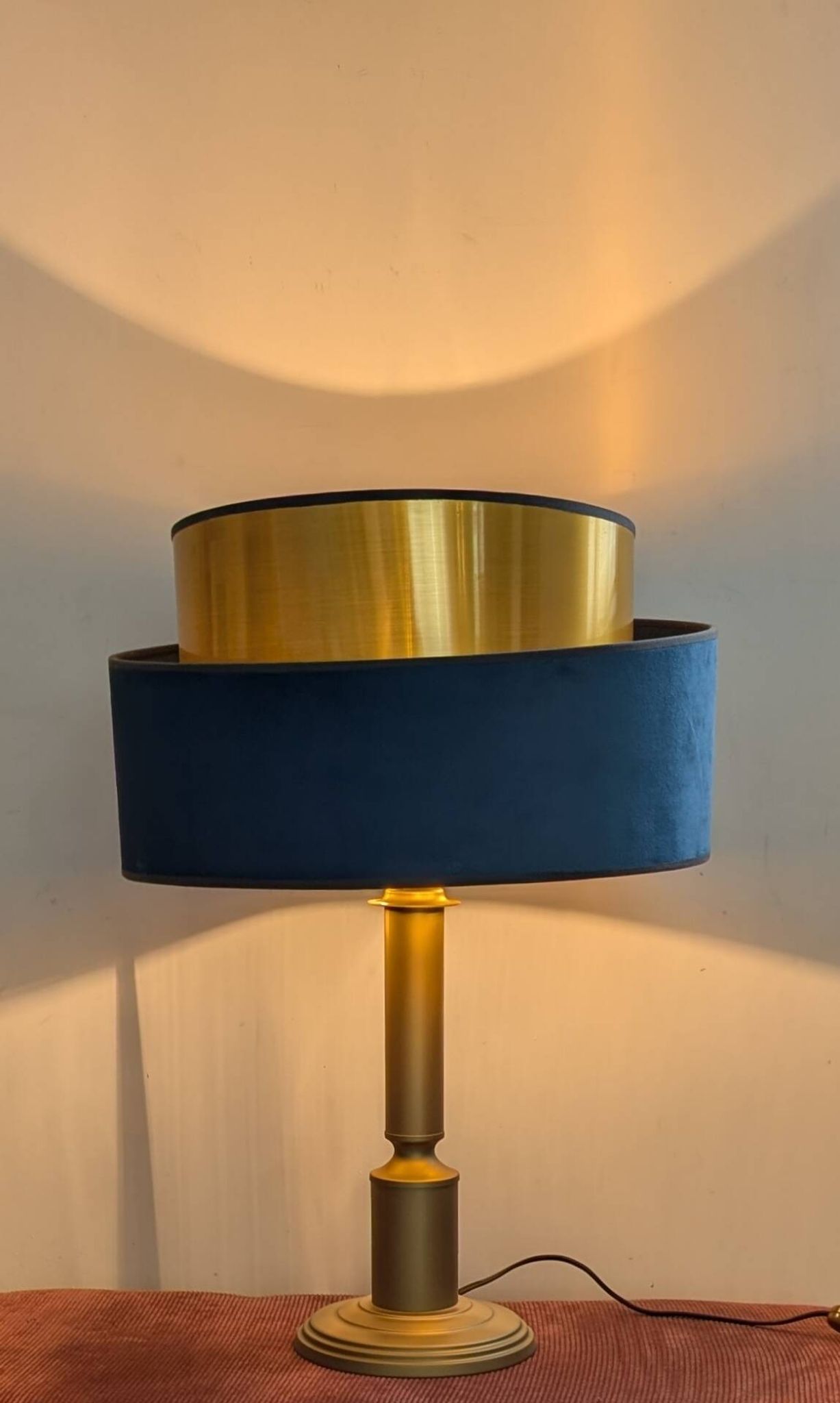 Brass lamp with asymmetrical velvet shade