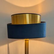 Brass lamp with asymmetrical velvet shade