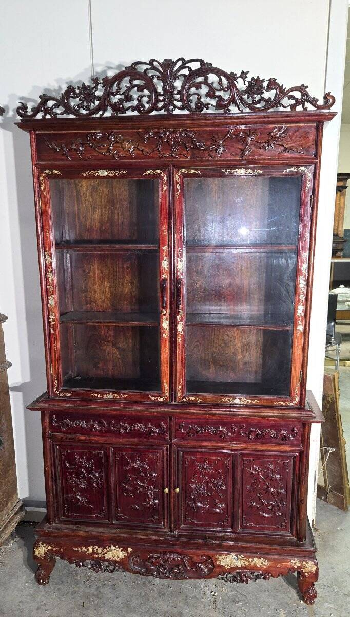 Asia 19th century: Ancient lacquer library, richly carved and decorated.