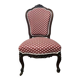 Napoleon III armchair reinterpreted – carved wood and shell pattern fabric