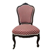 Napoleon III armchair reinterpreted – carved wood and shell pattern fabric