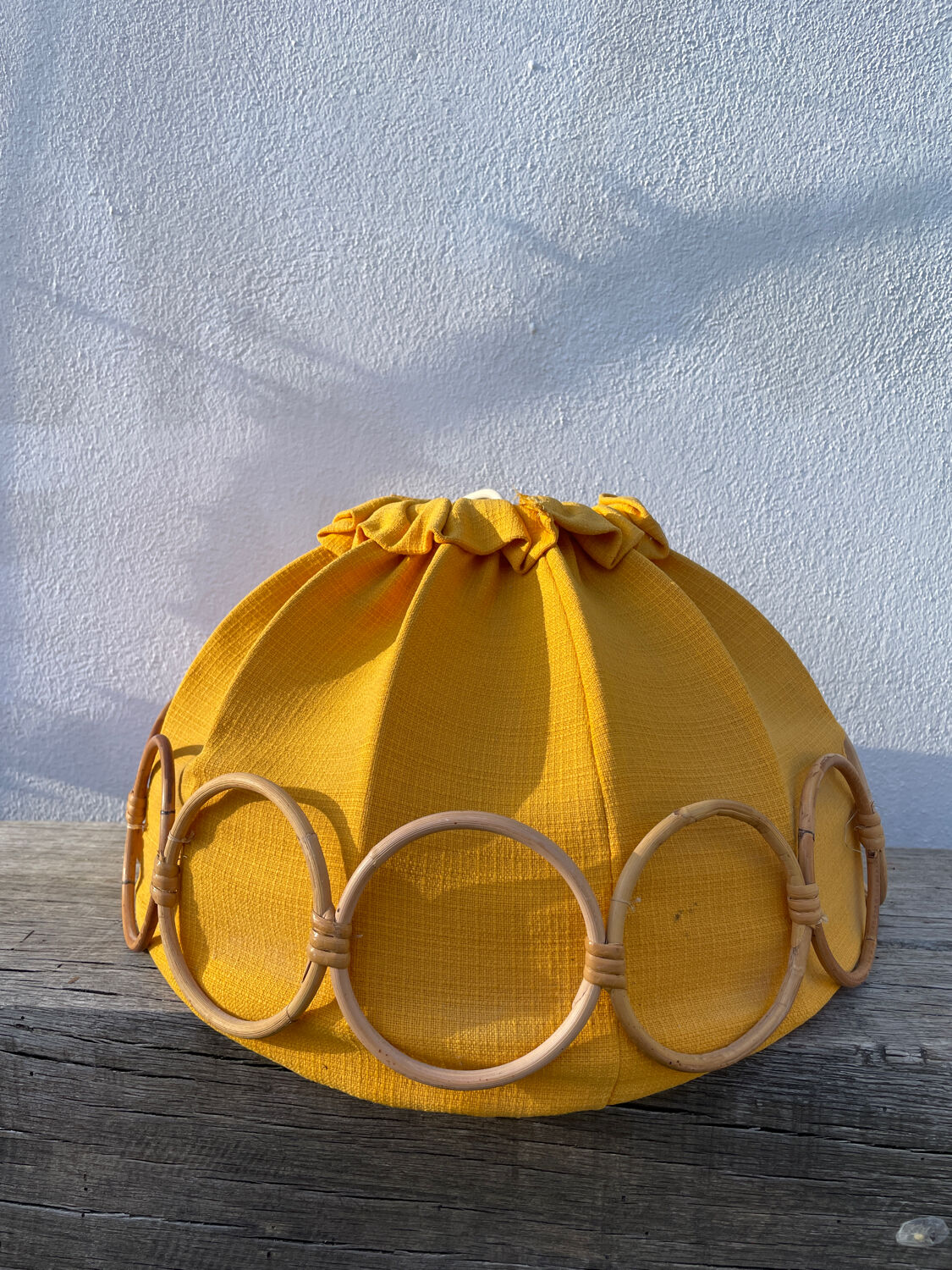 Wooden rattan and fabric suspension