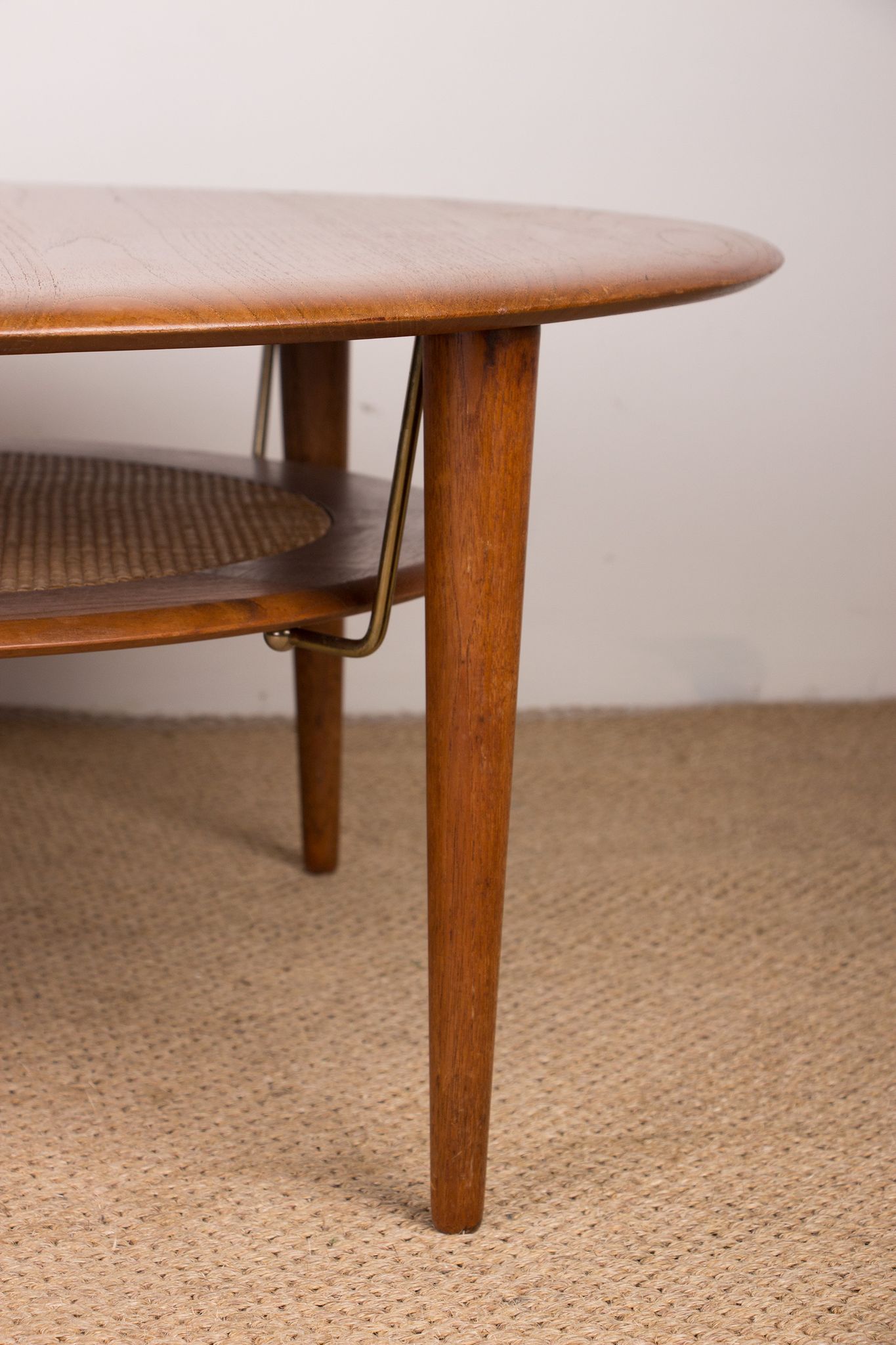 Round coffee table, two levels, danish in teak, brass and cannage