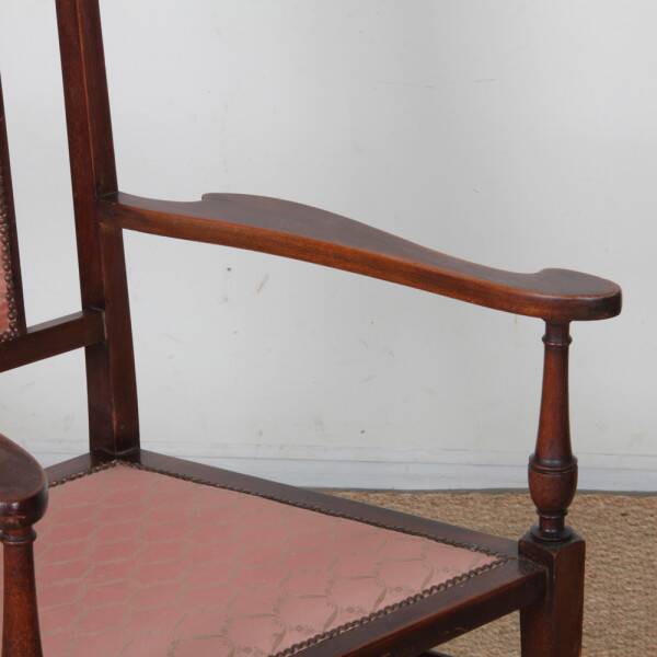 English armchair attributed to J.S. Henry, late 19th century.