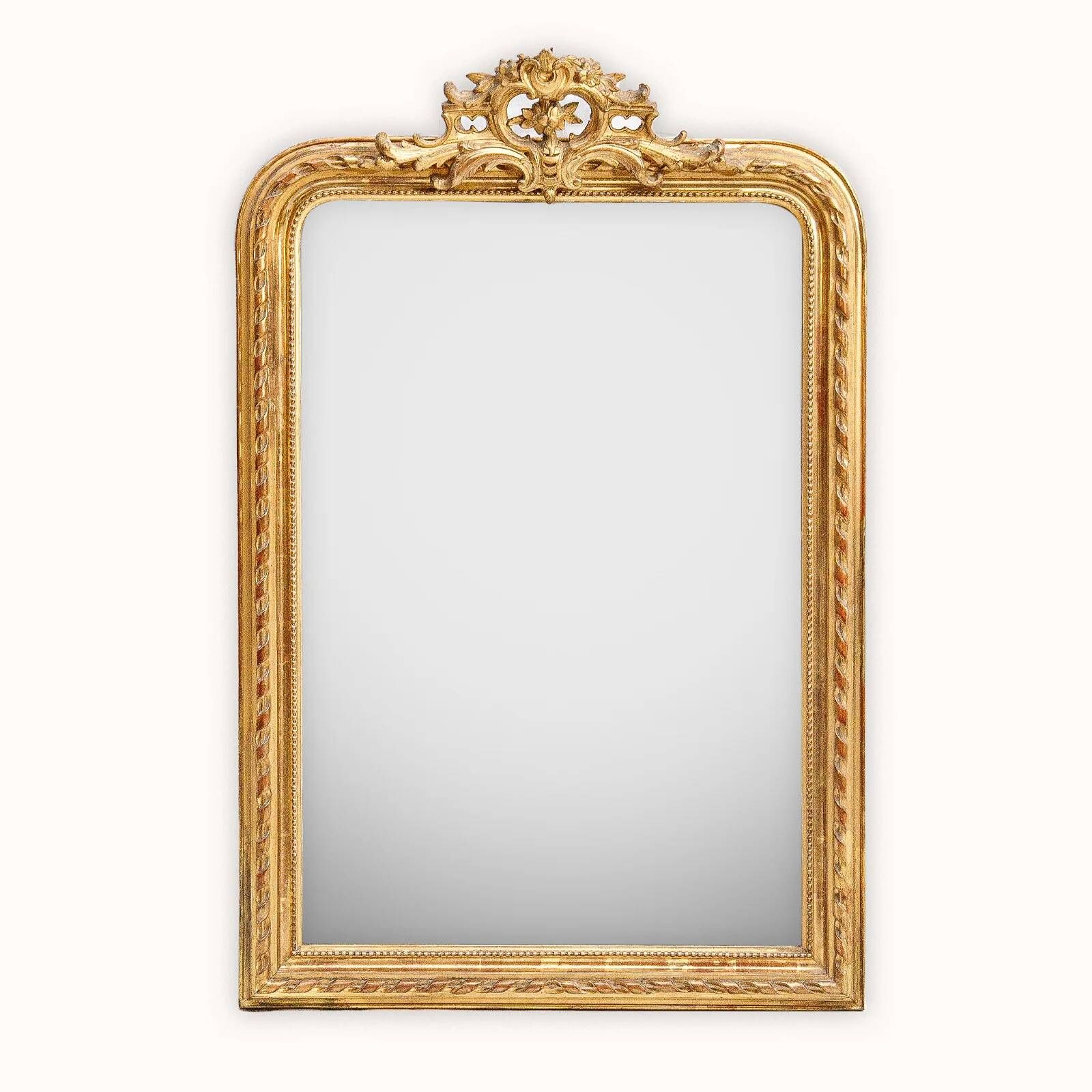 Louis-Philippe mirror from the 19th century with a ribbon trompe-l'œil frame.