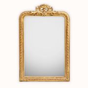 Louis-Philippe mirror from the 19th century with a ribbon trompe-l'œil frame.