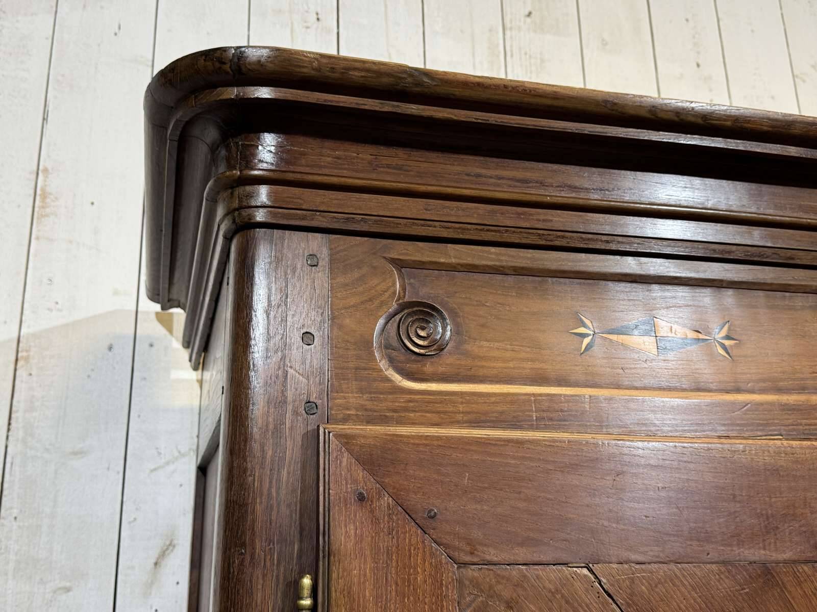 19th-century Breton wardrobe in oak and chestnut.