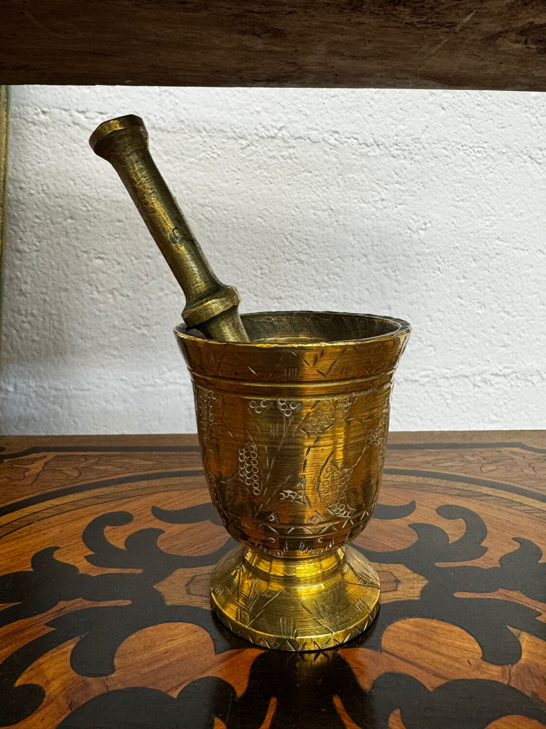 Golden brass mortar and pestle
