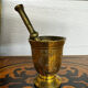 Golden brass mortar and pestle