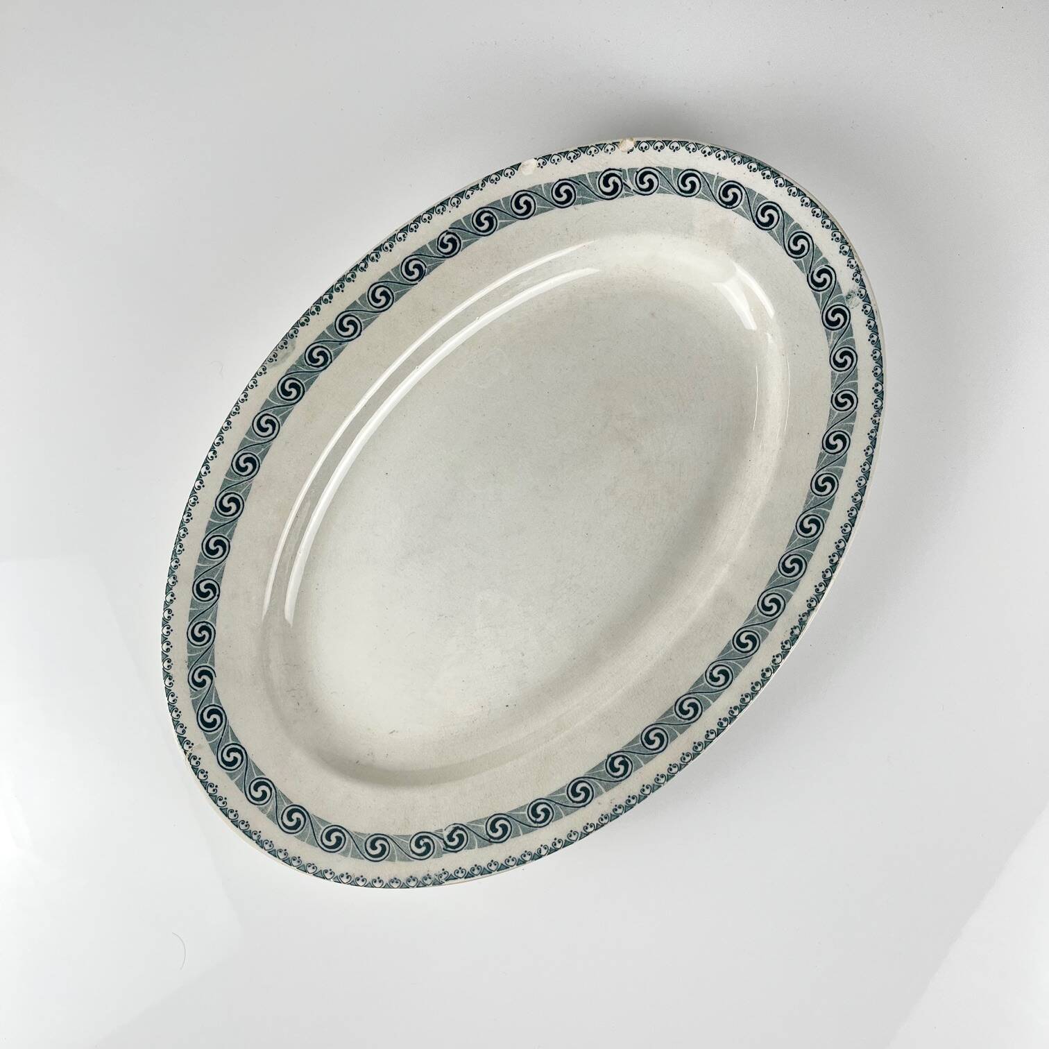 Large oval dish "Rachel" Moulins des loups & Hamage, iron earth, 20th century