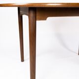 Dining table in dark oak of danish design from the 1960s.
