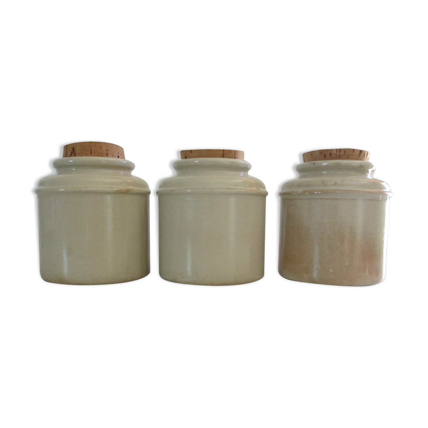 Series of three spice pots in sandstone