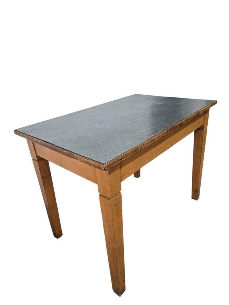 Vintage wooden table with a mint green top.