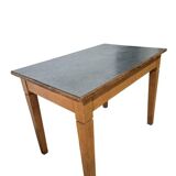 Vintage wooden table with a mint green top.