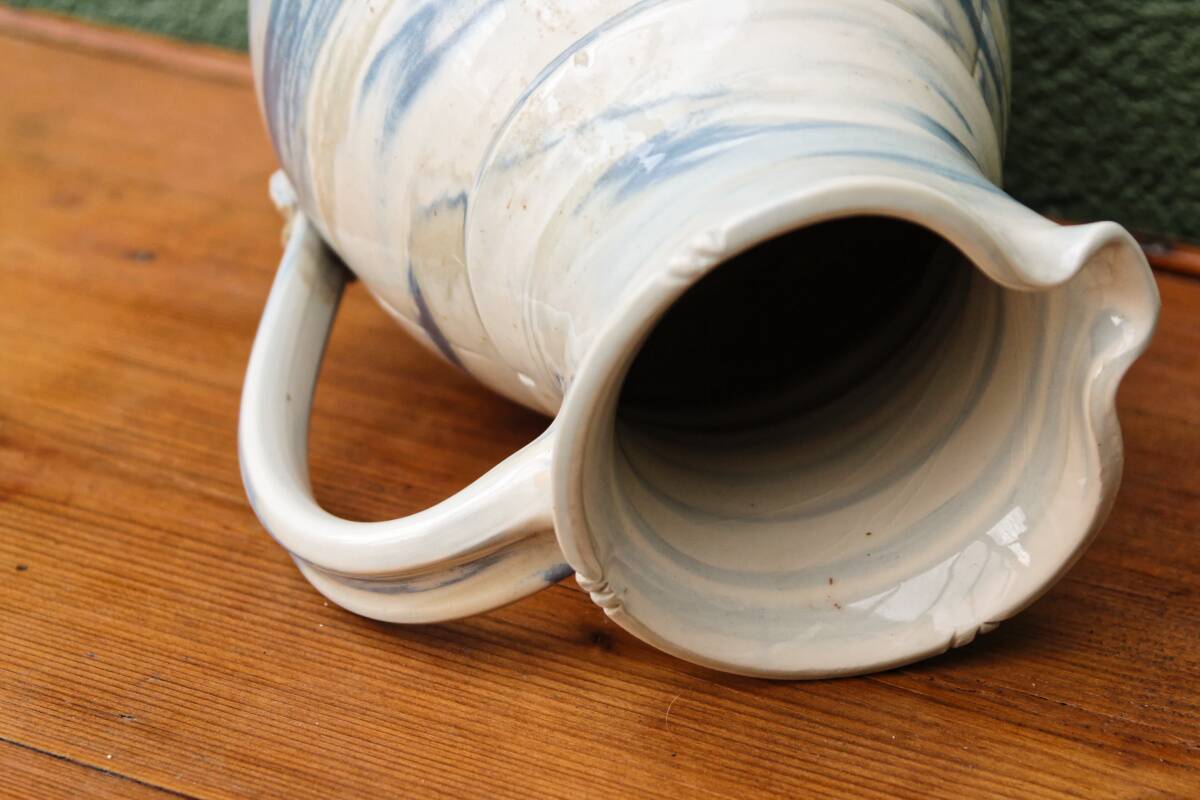 Water jug, signed, blue and white scrolls