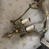 Wall lamp in Louis XV style in brass, shell decoration.