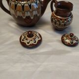 Combination of a teapot and a milk pot