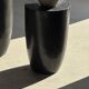 Stool, side table, end table in solid mango wood, cylindrical.