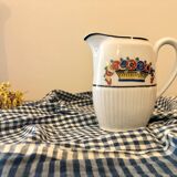 Small old milk jug