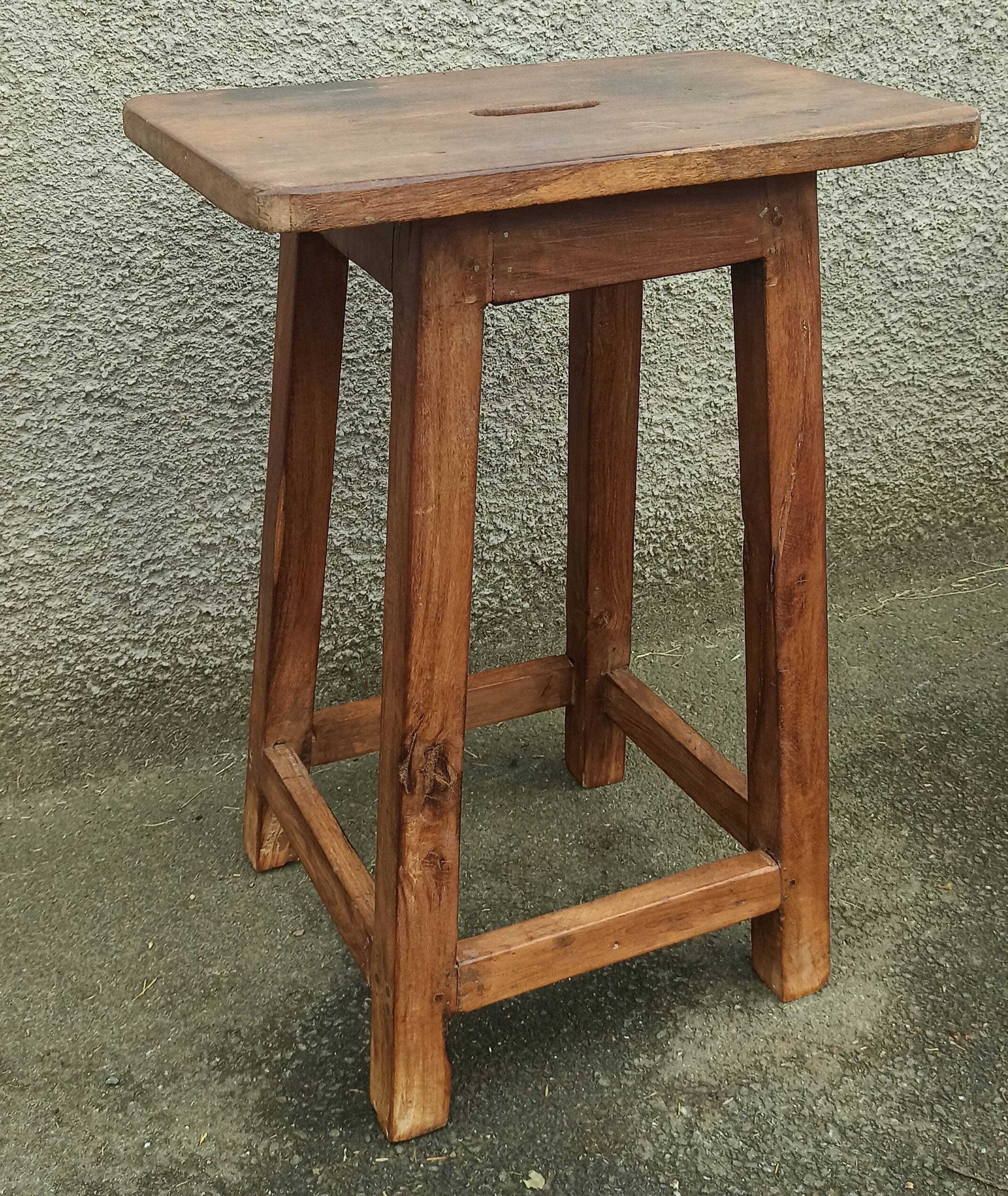 Old wooden high stool