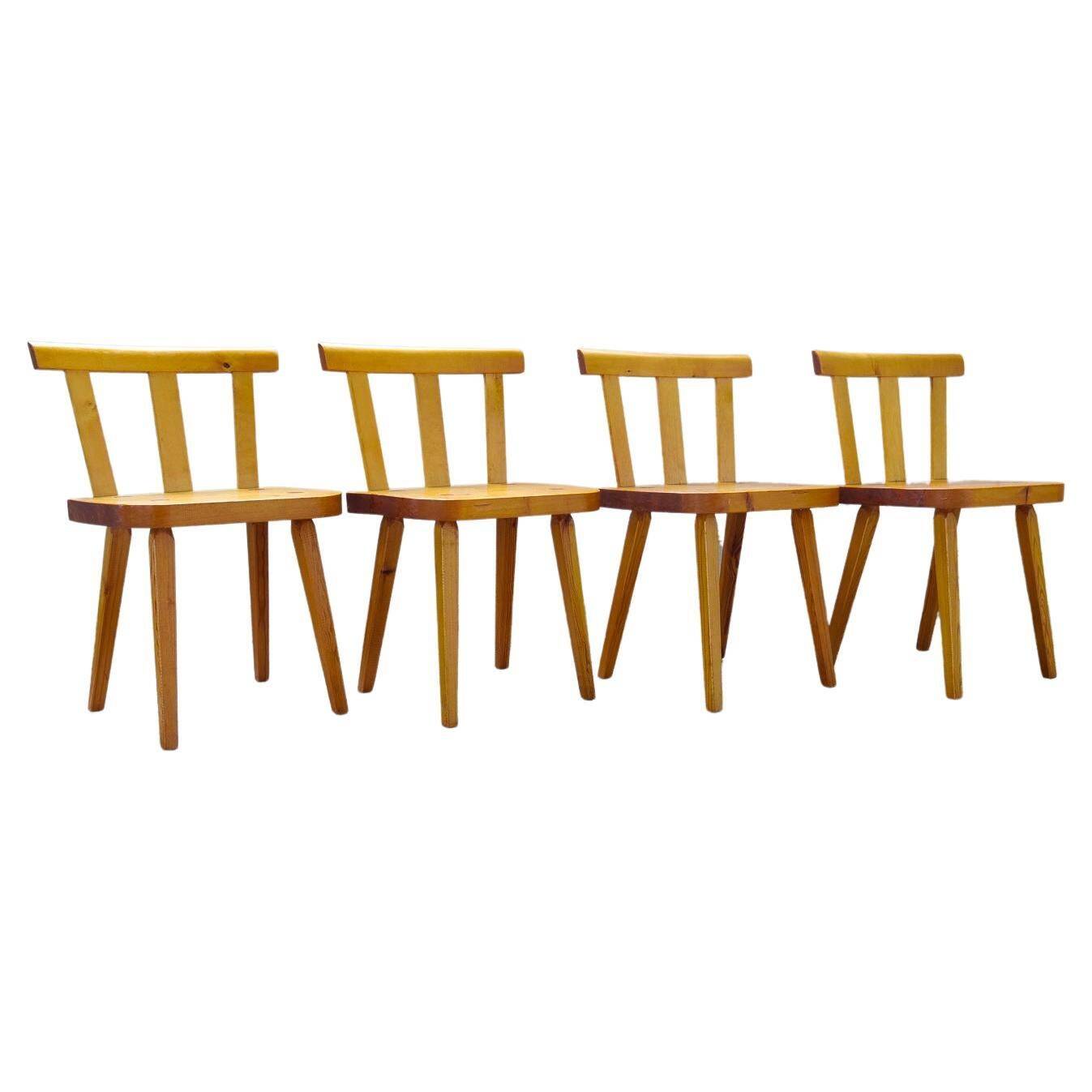 Modern Swedish set of 4 pine dining chairs.