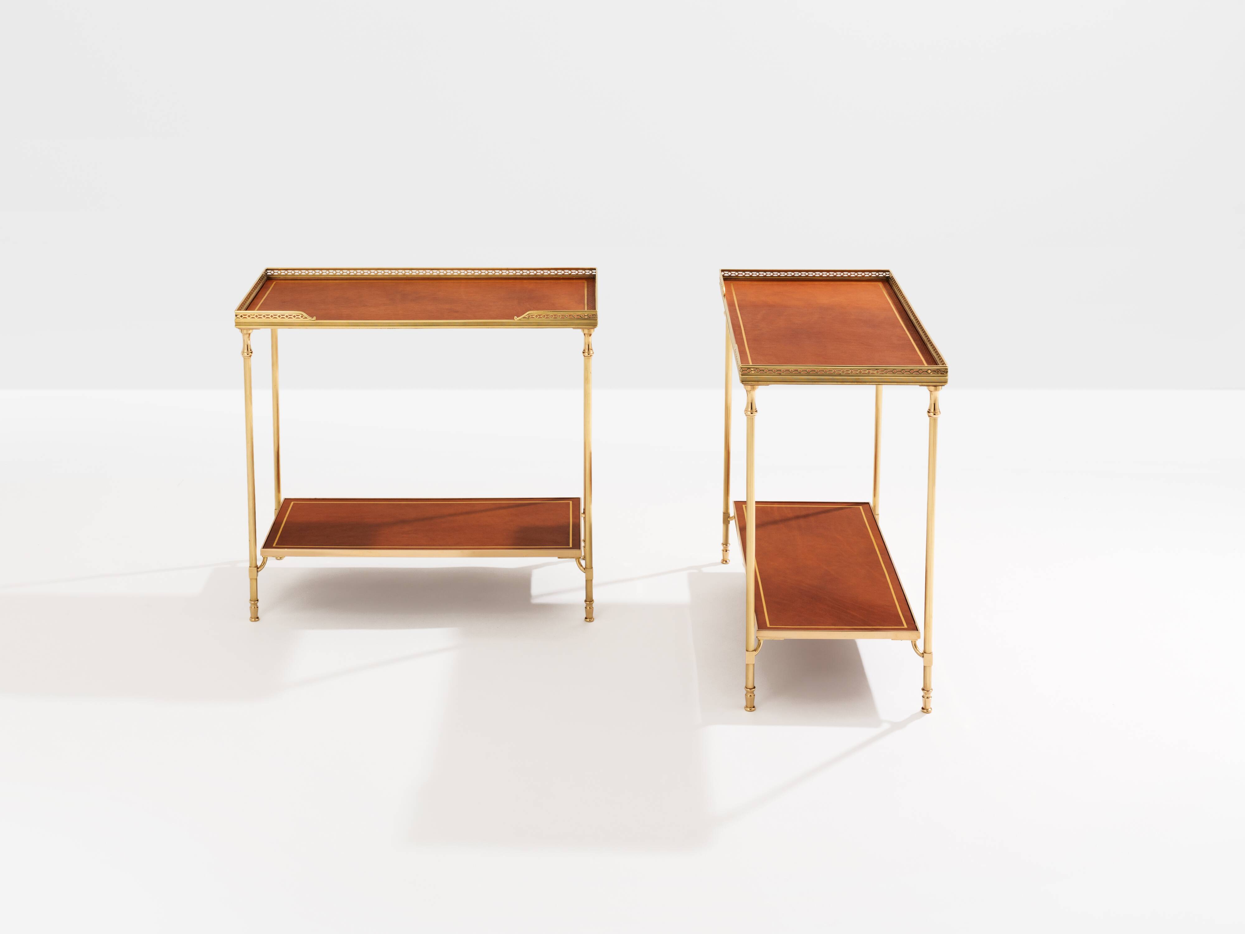 Pair of neoclassical brass and leather side tables by Maison Jansen, 1960