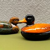 Enamelled terracotta boxes in the shape of ducks.