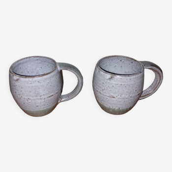 Two glazed stoneware mugs